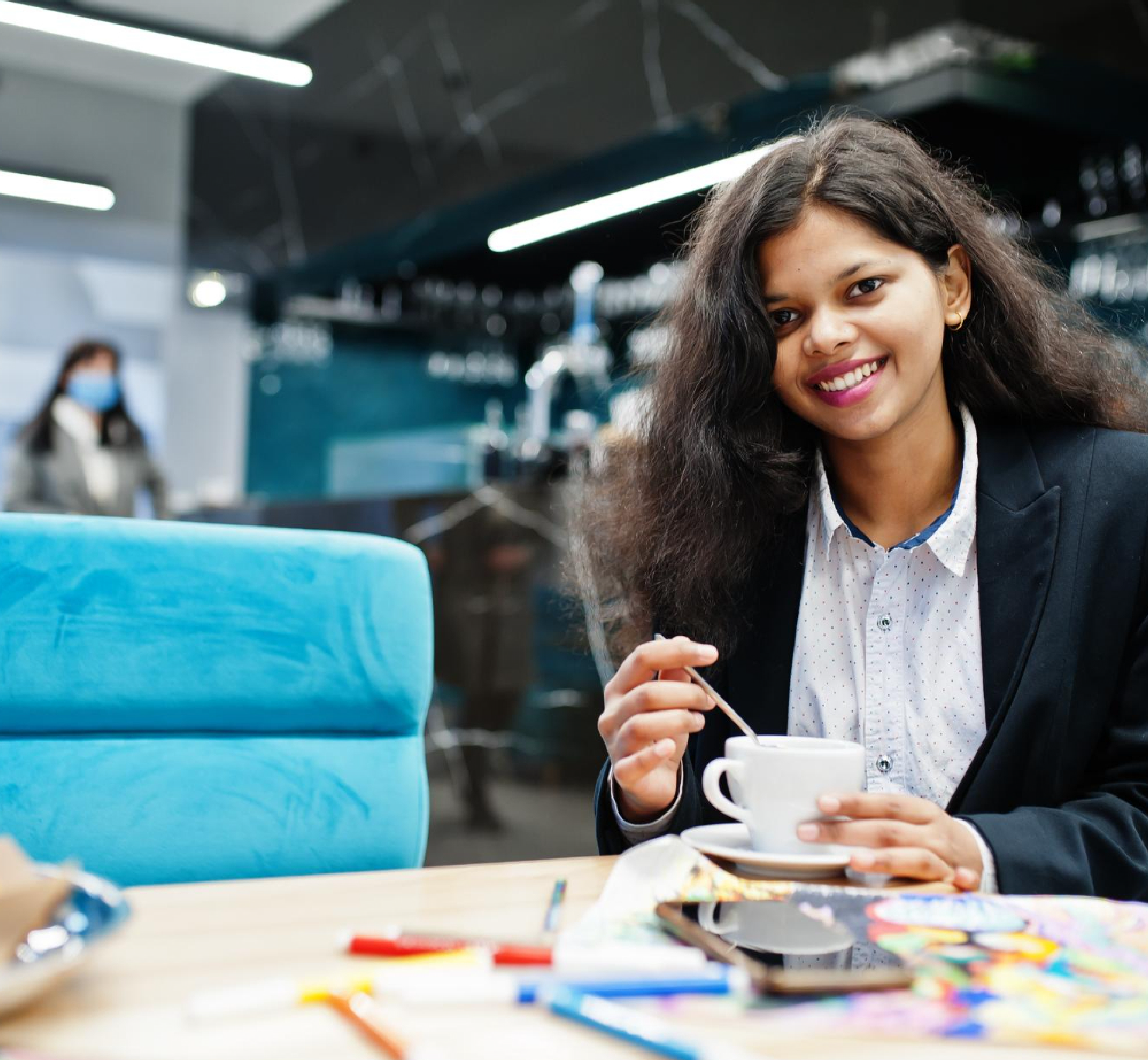 One Female employee having coffee